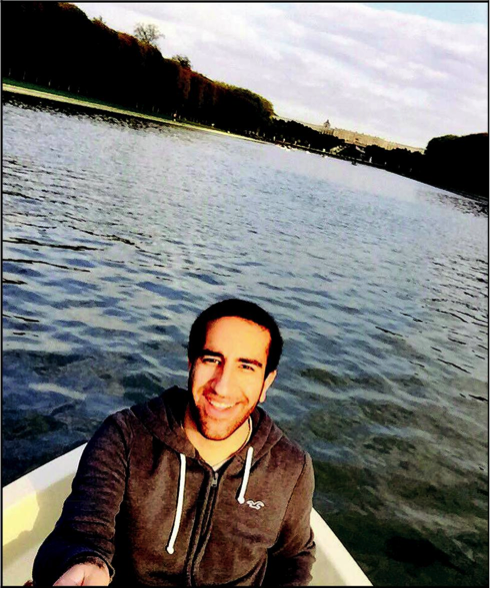 Junior Wasim Gendi boating on a pond in the Palace of Versaille’s gardens.
