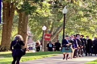 Graduates being led into Commencement.