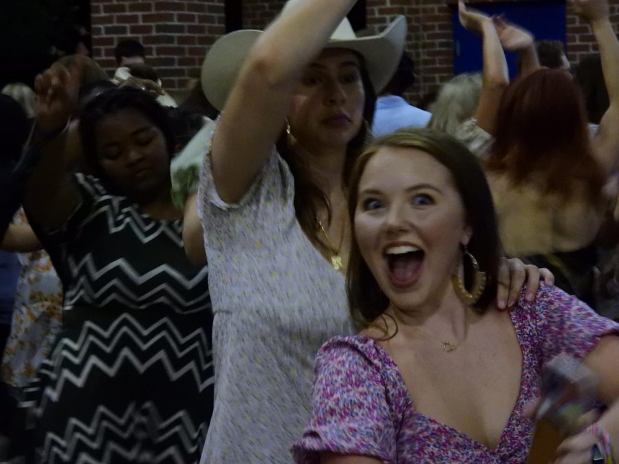 A student gets excited to be on camera. 