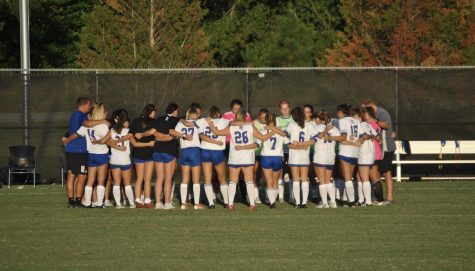 Blue Hose players prepare their mindset in their pregame huddle.