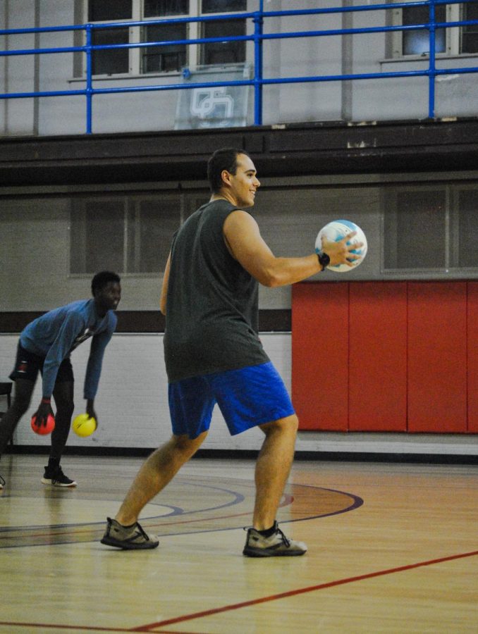 Walker Mathews deciding his next target with a volleyball in dodgeball.
