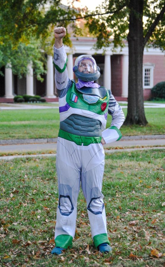 A person in a Buzz Lightyear costume gets set to blast off to the carnival.