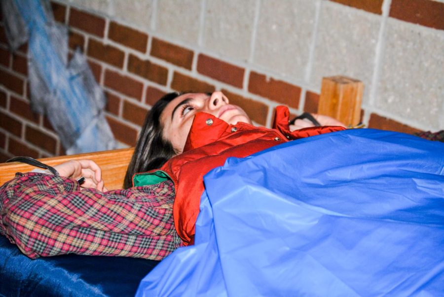 Sarah Smathers in character as she scares students who come down the haunted trail.