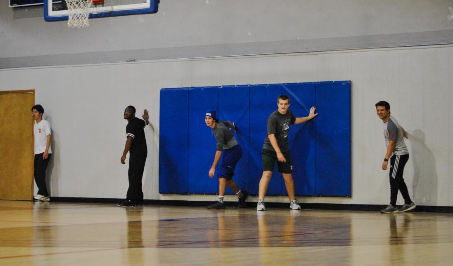 The champion team preparing to rush the court.