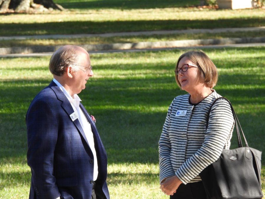 Will Kuhne and Jill Moylan (84), members of the PC Broad of Trustees, share a chat prior to the announcement of the colleges new strategic plan.