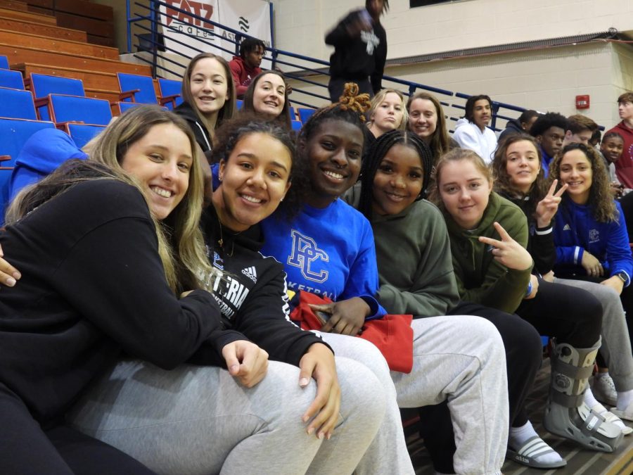 The Blue Hose womens basketball team pose for a picture while at the Multicultural Student Unions pep rally.