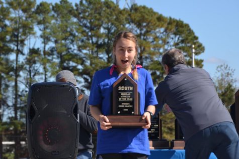 Jaraczewski with emotion as she receives the Big South Scholar-Athlete of the Year award in womens cross country. ©Christina Willis