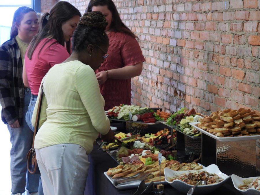 Guests enjoy food offered at 112 Musgrove.