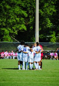 Pregame ritual huddle for PC’s Mens Soccer Team.
